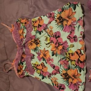 2 piece Pajamas top with matching shorts never worn too small. Like new lost tag